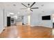 Open-concept living area featuring hardwood floors and seamless flow to the kitchen at 2701 Log Cabin Se Dr, Atlanta, GA 30339