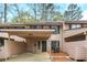 Inviting townhome with a covered parking area, showcasing a blend of comfort and convenience at 4870 Twin Lakes Trail, Atlanta, GA 30360