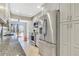 Updated kitchen features stainless appliances, granite countertops, and stylish white cabinets at 4870 Twin Lakes Trail, Atlanta, GA 30360