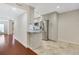 Open-concept kitchen with stainless steel appliances, granite countertops, and hardwood flooring at 4870 Twin Lakes Trail, Atlanta, GA 30360
