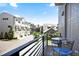 Cozy balcony view of upscale townhome community with patio furniture and relaxing atmosphere at 126 Chestnut Cir, Atlanta, GA 30342