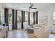 Inviting living room with large windows, neutral furniture, and shiplap wall accents at 126 Chestnut Cir, Atlanta, GA 30342