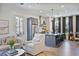 Open-concept living space with modern kitchen, island seating, and stylish decor at 126 Chestnut Cir, Atlanta, GA 30342
