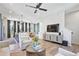 Bright, open-concept living space flowing into the kitchen with modern decor at 126 Chestnut Cir, Atlanta, GA 30342