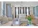 Open-concept living and kitchen area with large windows and stylish furnishings at 126 Chestnut Cir, Atlanta, GA 30342