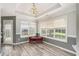 Elegant dining area featuring natural light, updated floors, and space for a large table at 1478 Elena Dr, Mcdonough, GA 30253