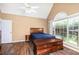 Large main bedroom featuring a vaulted ceiling, a ceiling fan and wood floors at 1478 Elena Dr, Mcdonough, GA 30253