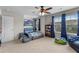 Spacious bedroom with windows, a bed with built-in seating and plenty of space for to play at 216 Orchard Trl, Canton, GA 30115
