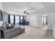 Spacious bonus room features recessed lights, ceiling fan, plush carpeting, and a comfortable sitting area at 216 Orchard Trl, Canton, GA 30115