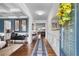 Inviting entryway with hardwood floors, decorative mirror, and elegant wainscoting at 216 Orchard Trl, Canton, GA 30115