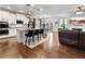Modern kitchen with white cabinets, granite countertops, and a center island with bar seating at 216 Orchard Trl, Canton, GA 30115