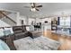Expansive living area flows seamlessly into kitchen and dining spaces, ideal for modern living at 216 Orchard Trl, Canton, GA 30115