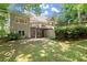 Large backyard area with a patio and a deck at 3600 Goldenrod Dr, Alpharetta, GA 30005