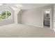 Bedroom with a vaulted ceiling, a large window and an ensuite bathroom at 3600 Goldenrod Dr, Alpharetta, GA 30005