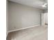 Spacious empty bedroom features a ceiling fan, plush carpeting, and an open doorway at 3600 Goldenrod Dr, Alpharetta, GA 30005