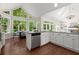 Eat-in kitchen with a vaulted ceiling, large windows and stainless steel appliances at 3600 Goldenrod Dr, Alpharetta, GA 30005