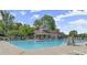 Relax by the large community pool with ample seating and a clubhouse nearby at 3600 Goldenrod Dr, Alpharetta, GA 30005