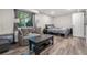 Spacious finished basement with a couch, bed, and wood floors at 507 Spring Creek Ne Way, Marietta, GA 30068