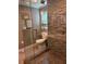 Modern bathroom featuring a tiled walk-in shower with glass door and neutral toned walls at 507 Spring Creek Ne Way, Marietta, GA 30068