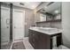Modern bathroom featuring a double vanity with square sinks and a glass-enclosed shower at 507 Spring Creek Ne Way, Marietta, GA 30068