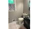 Bathroom with a vessel sink, a large mirror, and neutral-toned walls at 507 Spring Creek Ne Way, Marietta, GA 30068