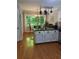Well-lit kitchen with an island, modern appliances, and a breakfast nook with a view at 507 Spring Creek Ne Way, Marietta, GA 30068