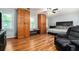 Spacious main bedroom featuring built-in wardrobe cabinets and hardwood floors at 507 Spring Creek Ne Way, Marietta, GA 30068