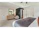 Spacious bedroom features a dresser with light wood and neutral decor at 1088 Battery Park Rd, Decatur, GA 30033