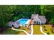Stunning aerial view of the community pool with ample seating and a clubhouse at 1088 Battery Park Rd, Decatur, GA 30033