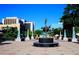View of a vibrant downtown square with a central fountain and well-maintained brick paving at 1088 Battery Park Rd, Decatur, GA 30033