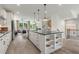 Modern kitchen with an island, stainless appliances, and a view to the living area at 1088 Battery Park Rd, Decatur, GA 30033