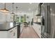 Modern kitchen features an expansive island, stainless appliances, and ample storage space at 1088 Battery Park Rd, Decatur, GA 30033