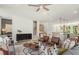 Open living area with stairs and modern furnishings, seamlessly flowing into the kitchen and dining area at 1088 Battery Park Rd, Decatur, GA 30033