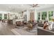 Open concept living room and kitchen with modern furnishings, stainless steel appliances and great natural light at 1088 Battery Park Rd, Decatur, GA 30033