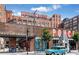 Exterior shot of the vibrant Ponce City Market, showcasing its historic brick facade and bustling entrance at 1088 Battery Park Rd, Decatur, GA 30033