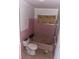 Outdated pink bathroom, offering a vintage charm, ready for a modern upgrade and renovation at 1101 Isa Se Dr, Atlanta, GA 30315