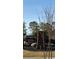 Klondike Reserve community entrance sign with stone base and natural landscaping at 216 Seward St # 93, Conyers, GA 30094