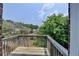 Balcony with wooded views, providing a private outdoor space to relax and enjoy nature at 3187 Mill Springs Cir, Buford, GA 30519