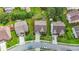 Overhead shot of a neighborhood featuring a home with a well-kept lawn and driveway at 5280 Lakerock Way, South Fulton, GA 30331