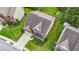 Aerial view of a well-maintained home with a brown roof and a green, fenced backyard at 5280 Lakerock Way, South Fulton, GA 30331