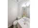 Well-lit bathroom with a single sink vanity and shower over tub at 5280 Lakerock Way, South Fulton, GA 30331