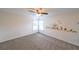 Cozy bedroom featuring carpet, corner windows and wall decals at 5280 Lakerock Way, South Fulton, GA 30331