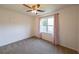 Cozy bedroom with carpet flooring and natural light from the windows at 5280 Lakerock Way, South Fulton, GA 30331