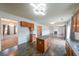 Bright kitchen featuring an island, tile floors, and updated cabinets at 5280 Lakerock Way, South Fulton, GA 30331