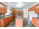 Modern kitchen with an island, stainless steel appliances, ample cabinet space, and plenty of room to cook at 5280 Lakerock Way, South Fulton, GA 30331