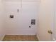 Clean and functional laundry room area with tiled floor at 5280 Lakerock Way, South Fulton, GA 30331