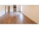 Open living room featuring hardwood floor and fireplace at 5280 Lakerock Way, South Fulton, GA 30331