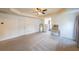 Spacious main bedroom with carpet flooring, and neutral-colored walls at 5280 Lakerock Way, South Fulton, GA 30331