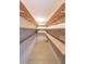 Walk-in pantry with multiple shelves and white support brackets providing ample storage space at 5280 Lakerock Way, South Fulton, GA 30331