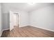 A bright bedroom with new wood-look flooring, light gray walls, and a double door closet at 1800 Clairmont Lk # 412, Decatur, GA 30033